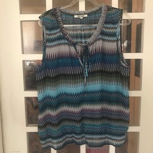 Sleeveless peplum hem top